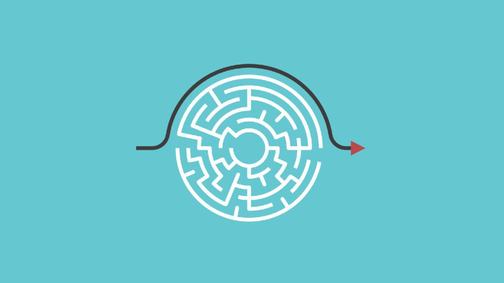 An arrow around a circular maze.
