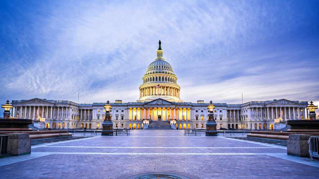 The Capitol Building in Washington, D.C., USA lit up in the early evening.
